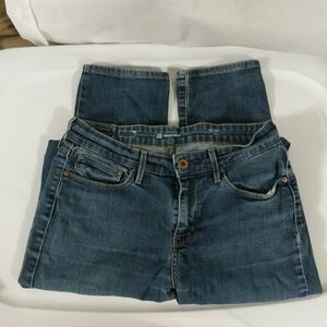 Levi's Mid Rise Slim Straight Leg Demi Curve Medium Wash Jeans - size 28